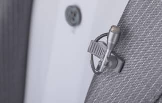 A DPA Lavalier Microphone attached to a suit lapel