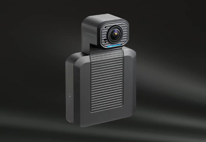 A black, square-shaped PTZ camera.